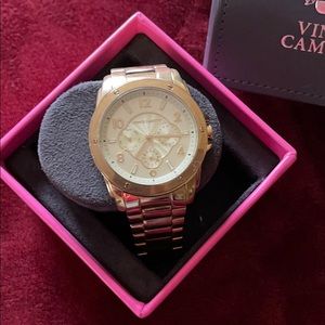 Vince Camuto women’s gold watch